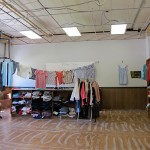 An entire old classroom full of old clothes.